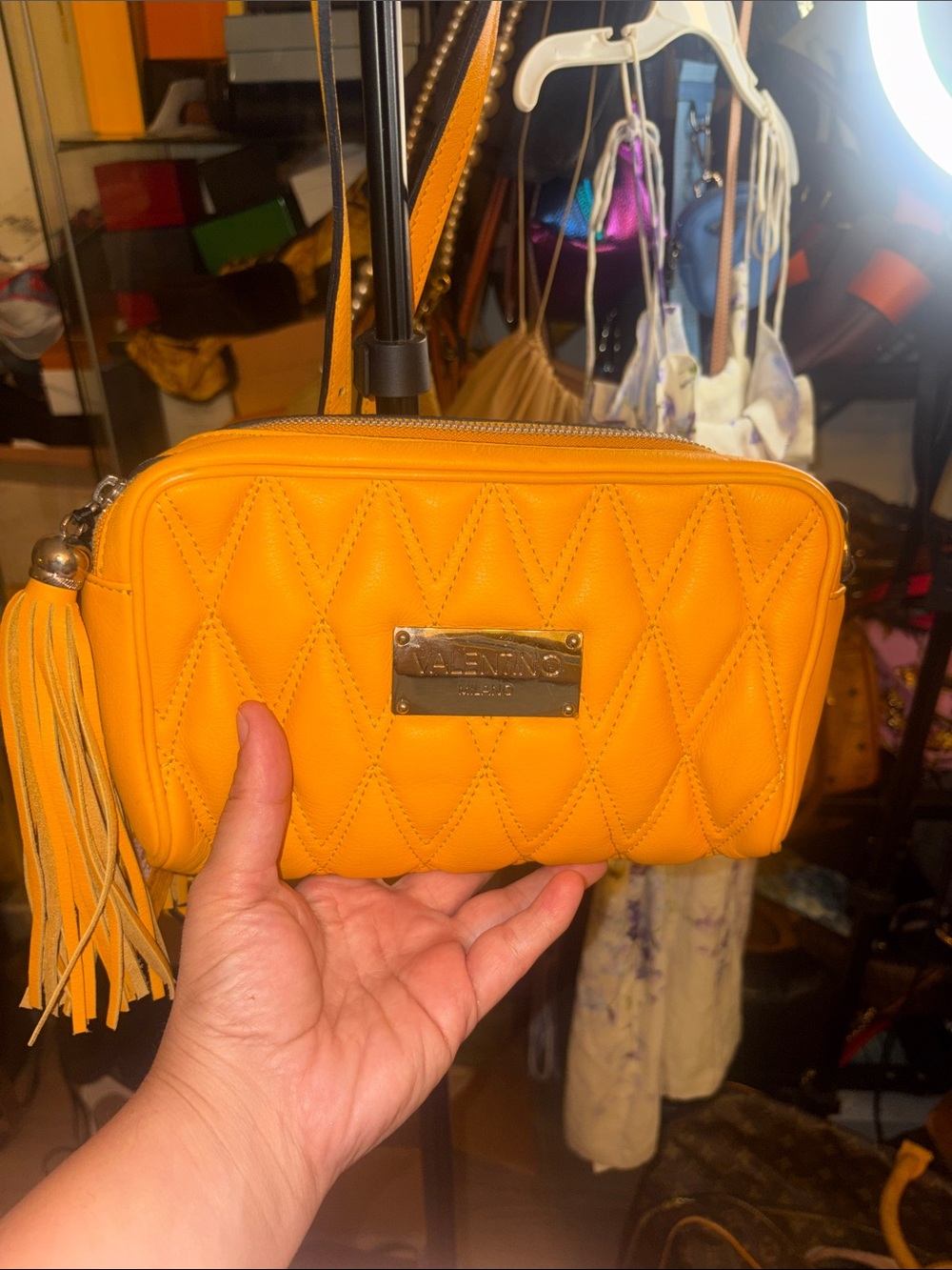 Valentino Quilted Orange Wristlet with Tassel Plate